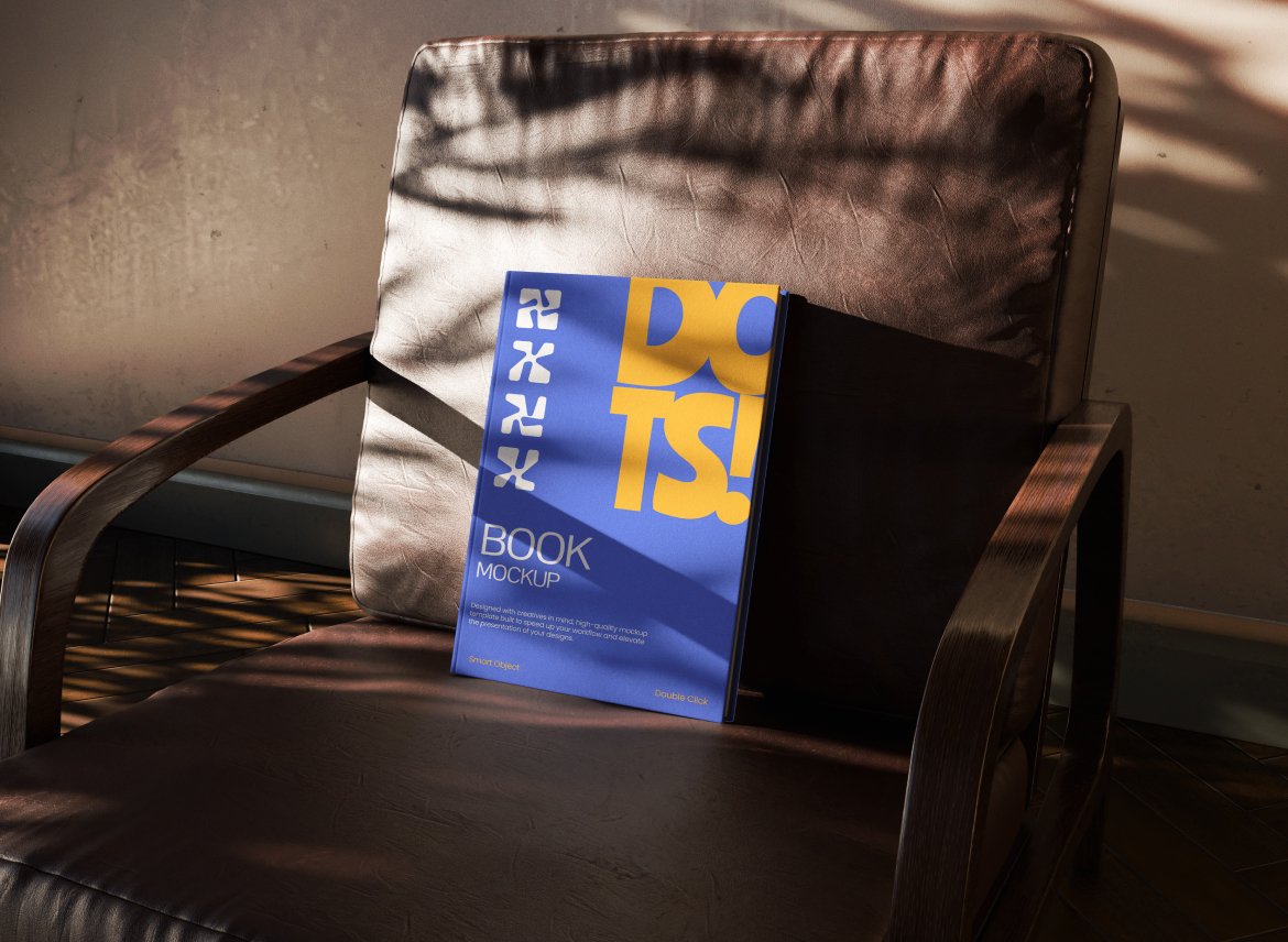 椅子上的书籍封面展示样机 Hardcover Book Mockup